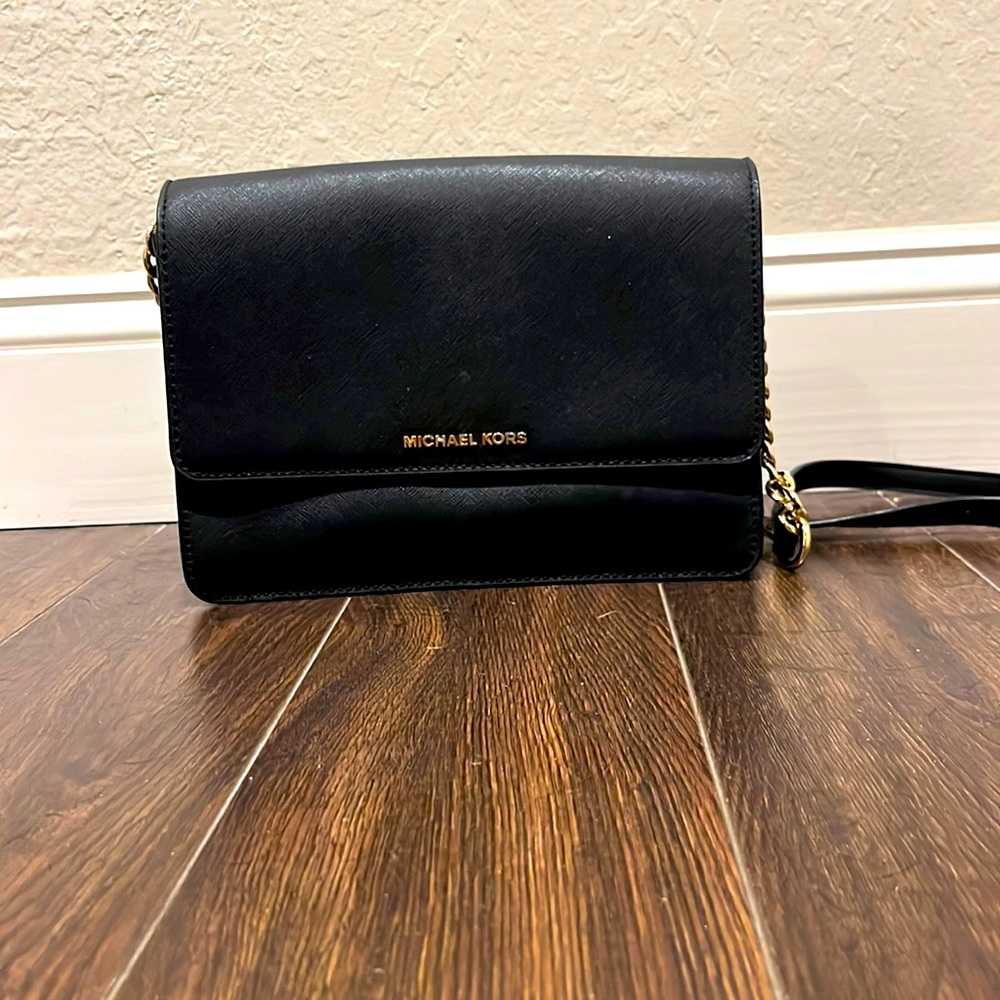 Black Michael Kors crossbody bag. I’m good condition